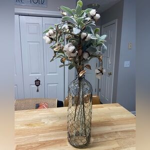 Chicken wire vase with greenery
